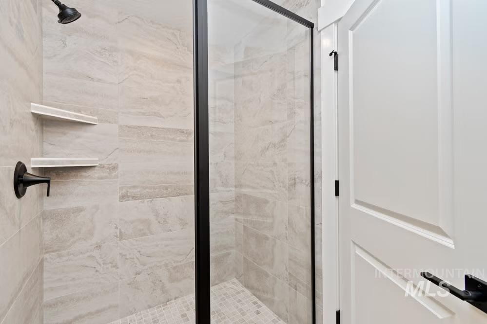 744 South Calhoun Lane Star, ID 83669 - Photo 11 of 34 Bathroom with a marble finish shower