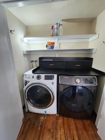 a utility room with dryer and washer