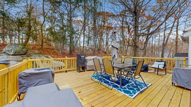 a view of a swimming pool with lounge chairs