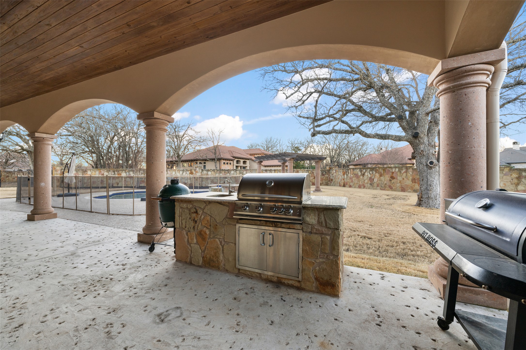 101 Hopewell Circle Georgetown, TX 78628 - Photo 21 of 38 Fenced backyard featuring exterior kitchen and a patio