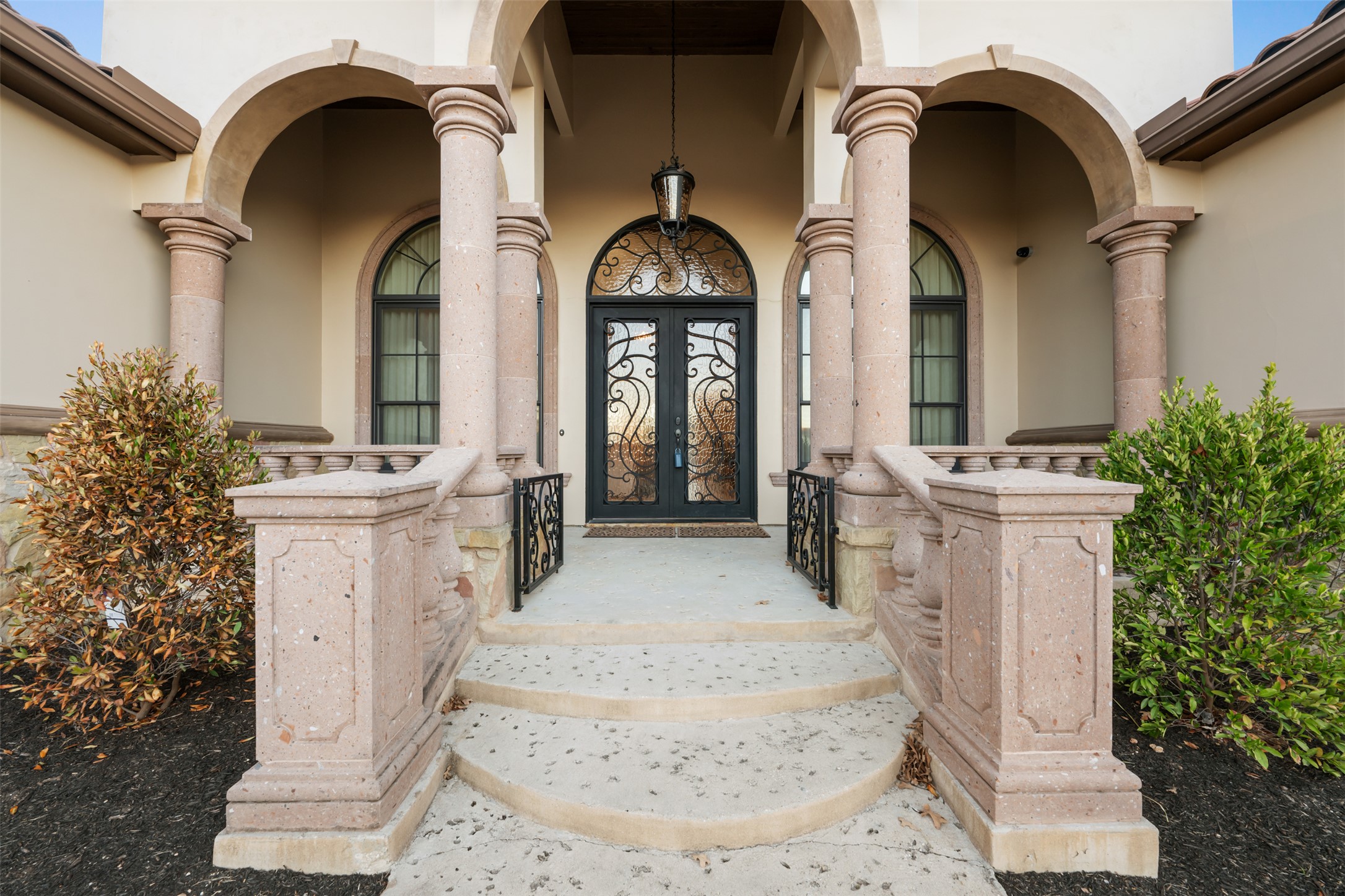 101 Hopewell Circle Georgetown, TX 78628 - Photo 3 of 38 Doorway to property featuring stucco siding, a porch, and french doors