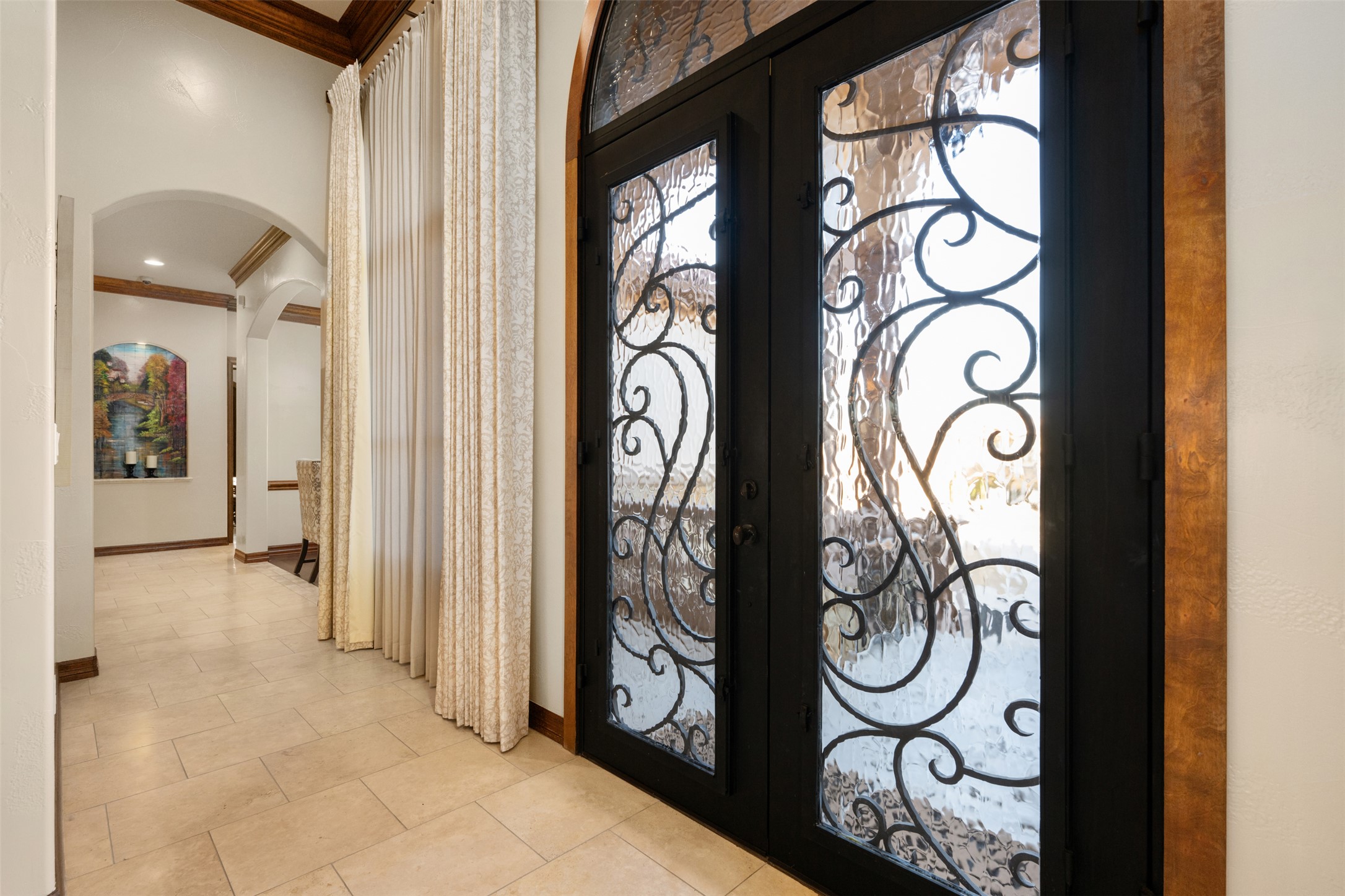 101 Hopewell Circle Georgetown, TX 78628 - Photo 4 of 38 Tiled foyer entrance featuring french doors, crown molding, and arched walkways