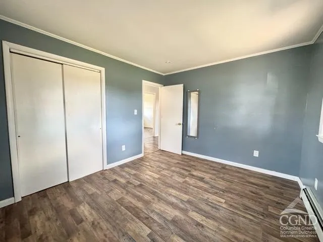 a view of an empty room and window