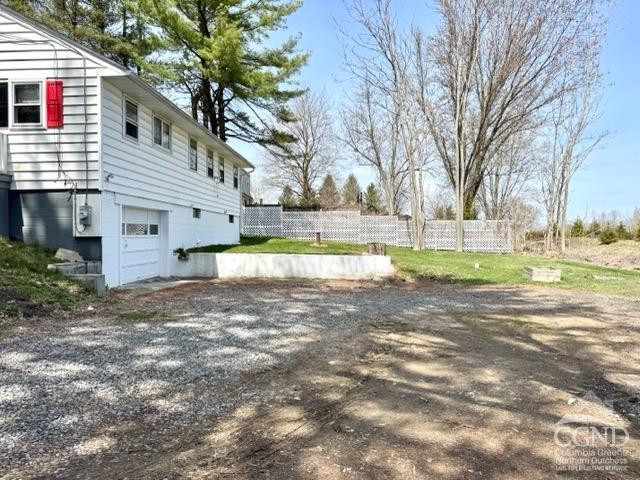 207 Stottville Road Hudson, NY 12534 - Photo 33 of 33 a view of a house with a yard and trees