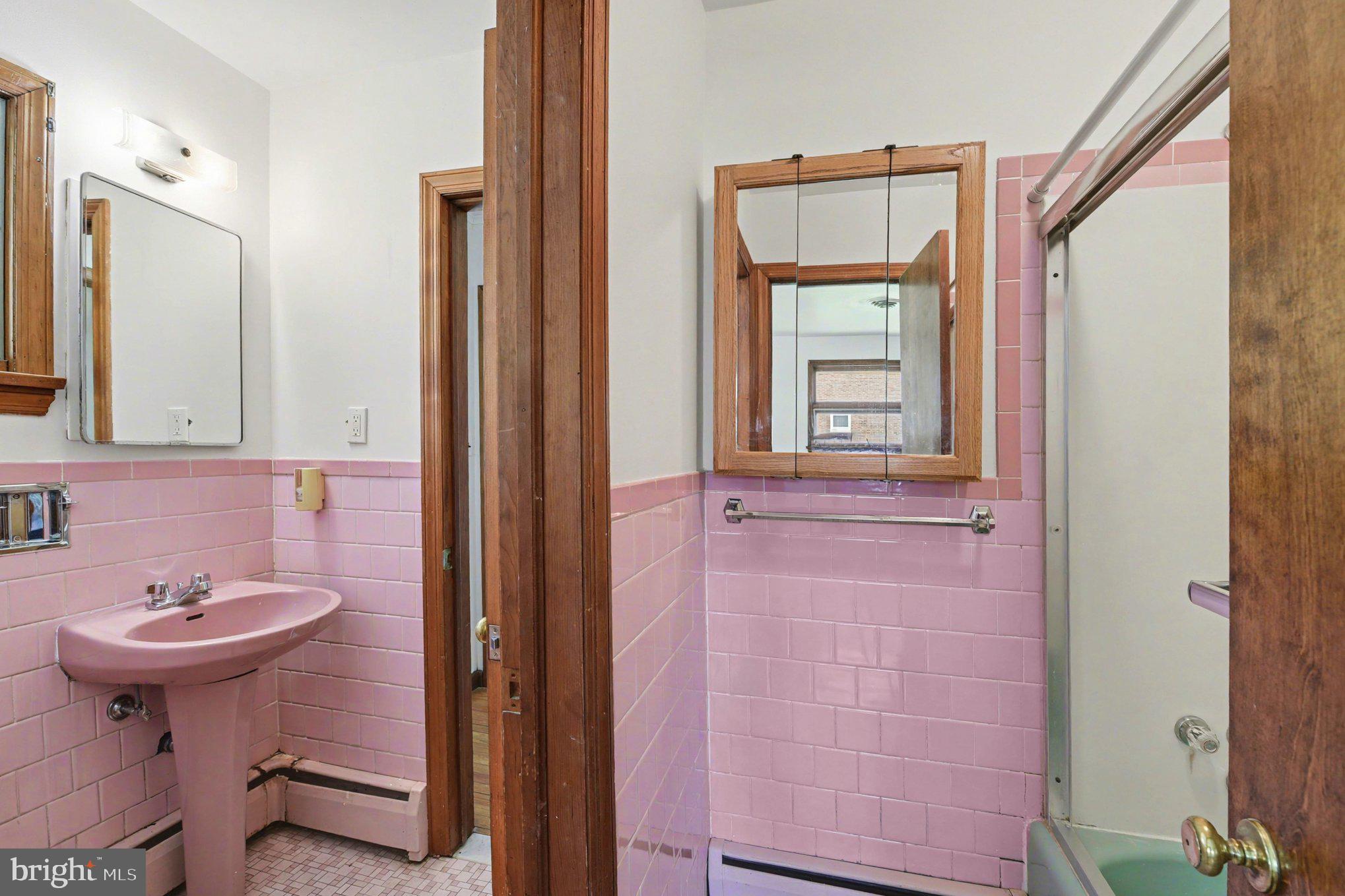 3418 Walnut Road Aberdeen, MD 21001 - Photo 21 of 38 a bathroom with a sink a mirror and a toilet