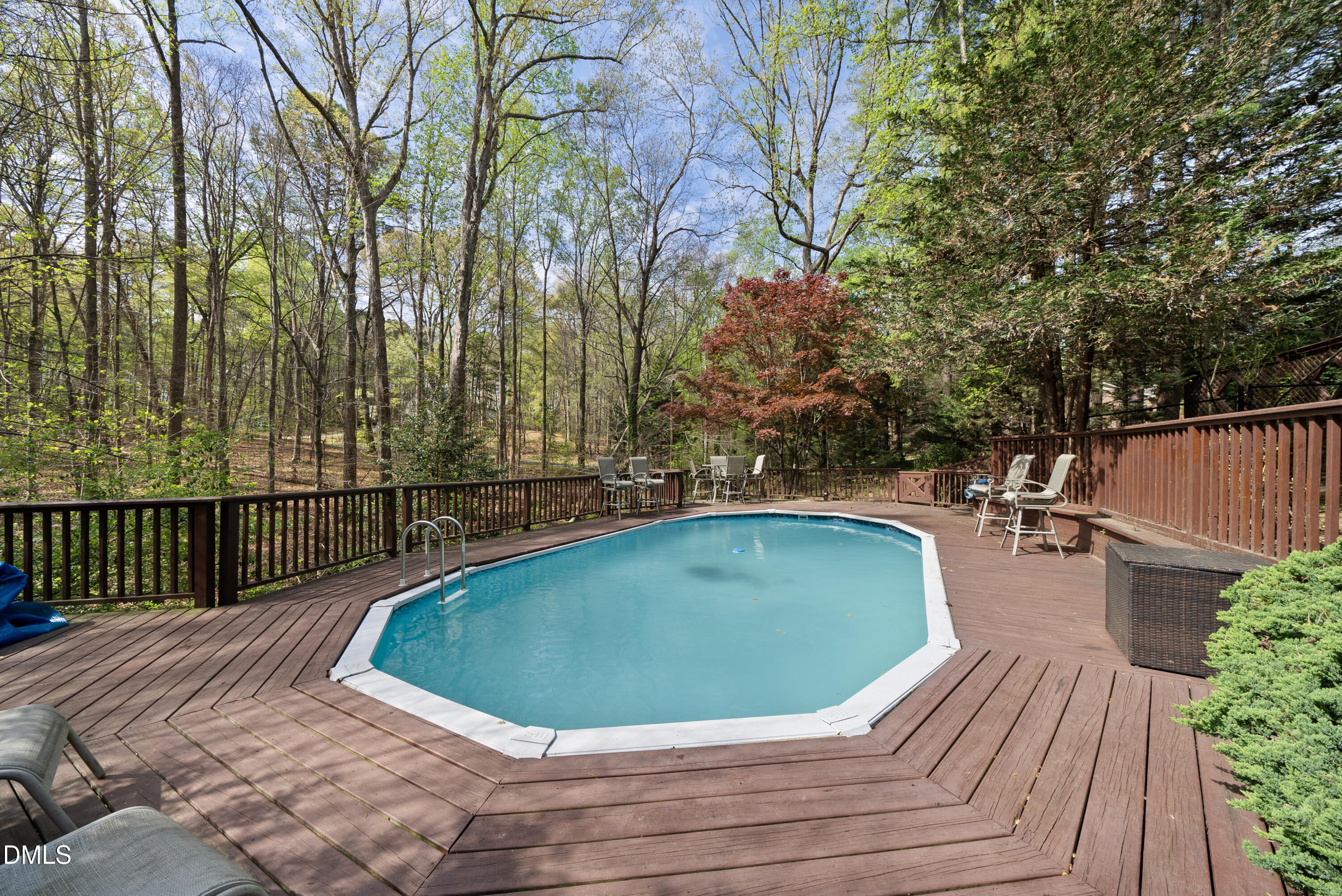 6200 Splitrock Trail Apex, NC 27539 - Photo 54 of 64 a view of a swimming pool with a patio and yard