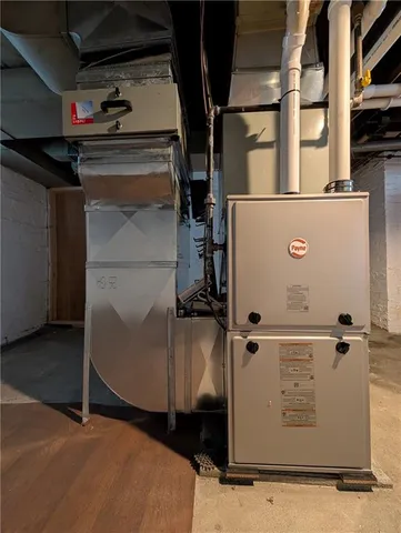 a view of an empty room with wooden walls