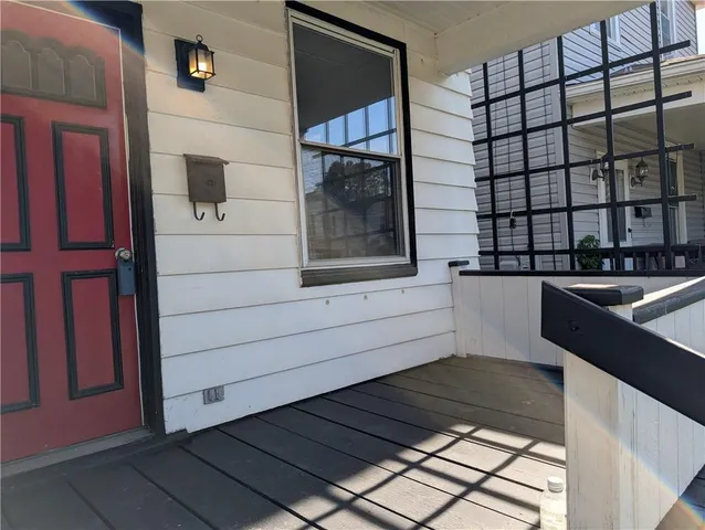 a bathroom with a bathtub and shower