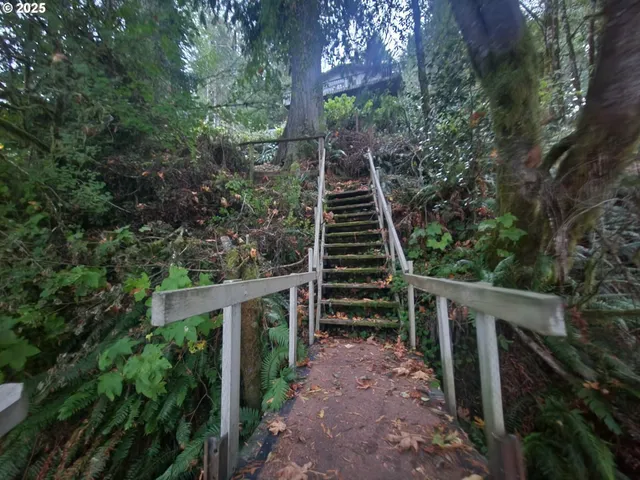a view of stairs and wooden wall