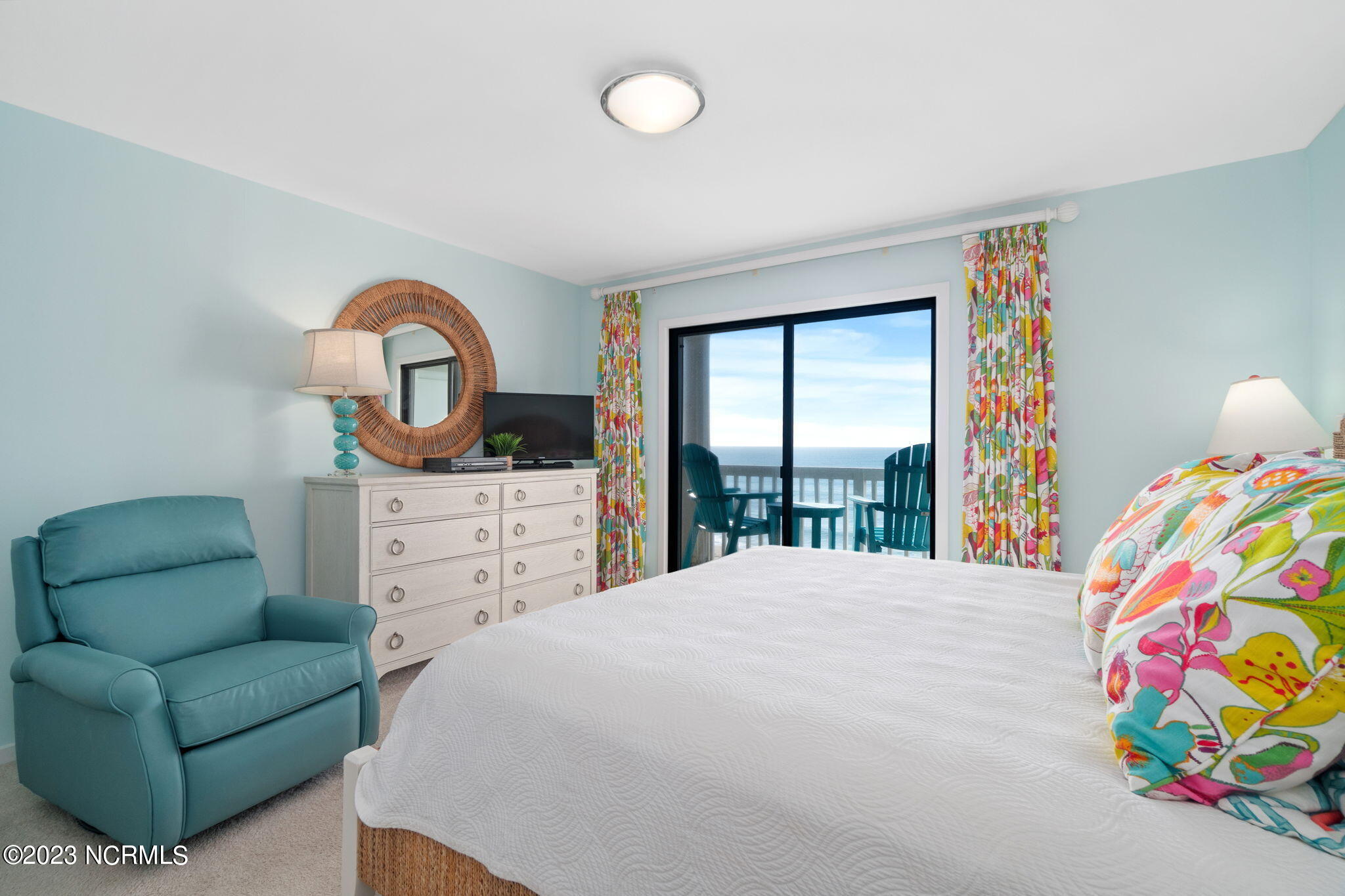 525 Salter Path Road, Unit A33 Atlantic Beach, NC 28512 - Photo 17 of 37 Porch access from primary suite as well.