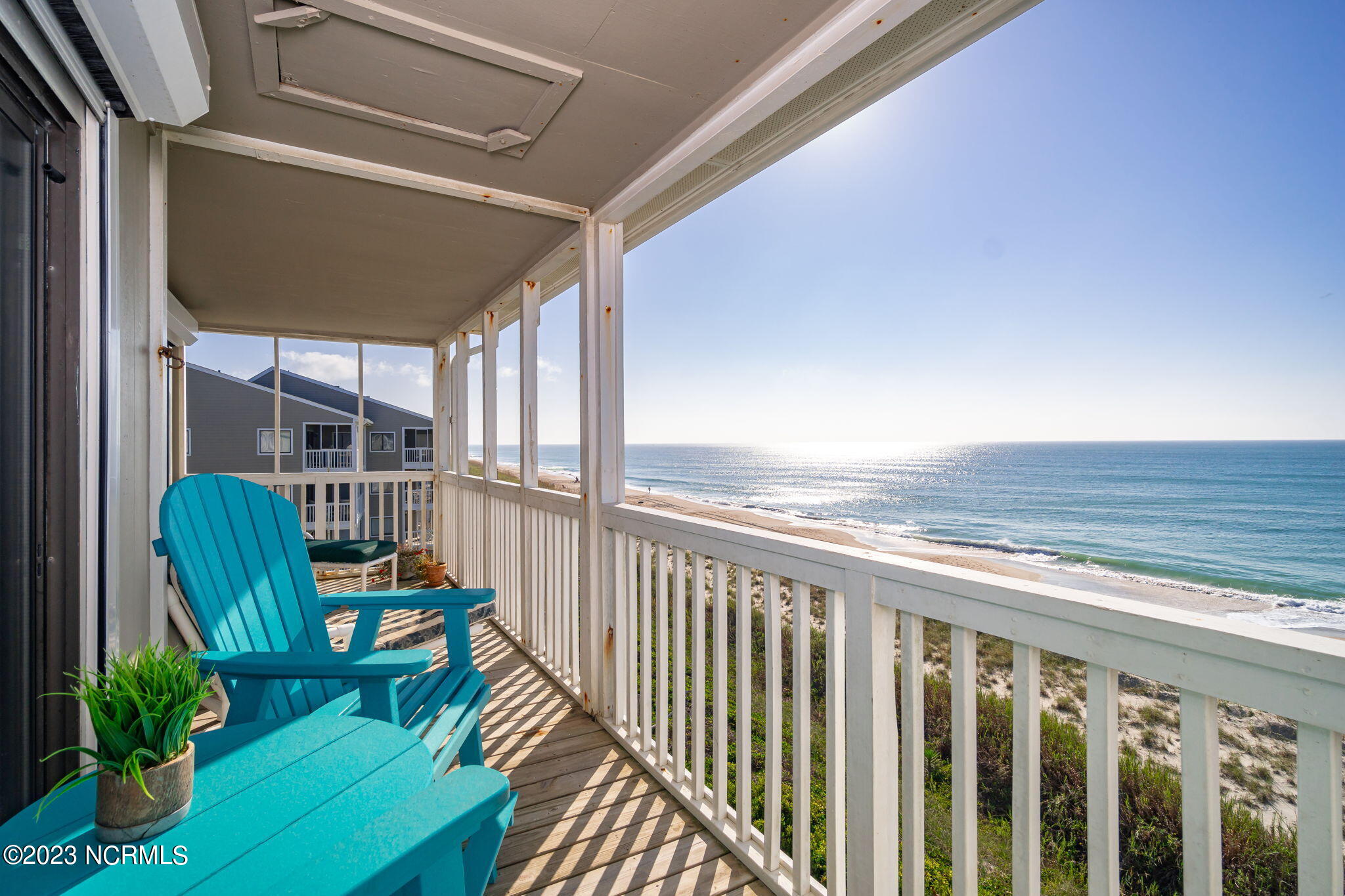 525 Salter Path Road, Unit A33 Atlantic Beach, NC 28512 - Photo 2 of 37 Access from living area and primary suite.