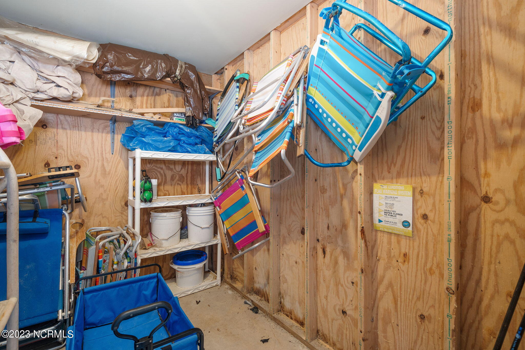 525 Salter Path Road, Unit A33 Atlantic Beach, NC 28512 - Photo 27 of 37 Ground floor storage closet