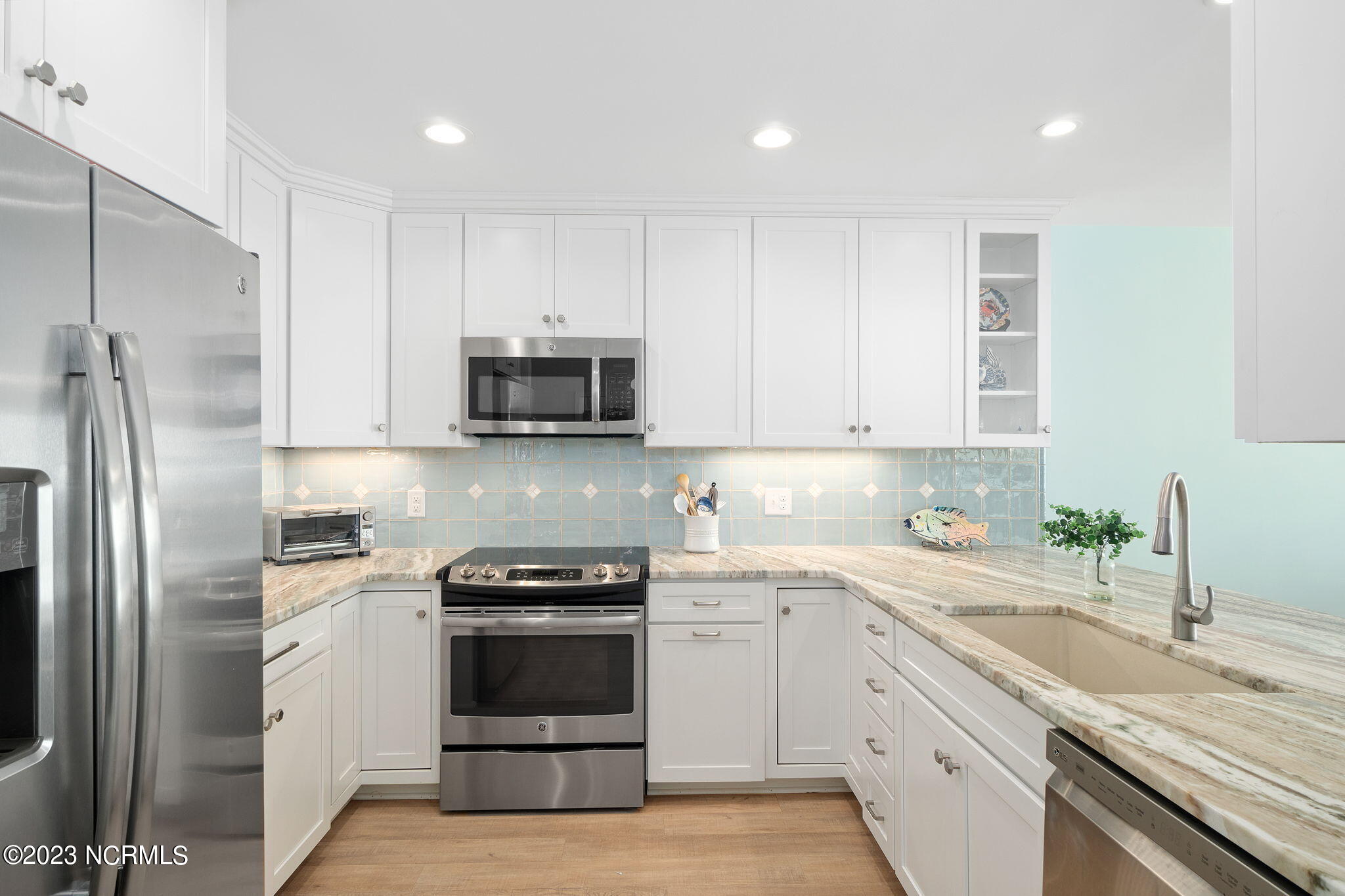 525 Salter Path Road, Unit A33 Atlantic Beach, NC 28512 - Photo 4 of 37 Kitchen w/ bar seating