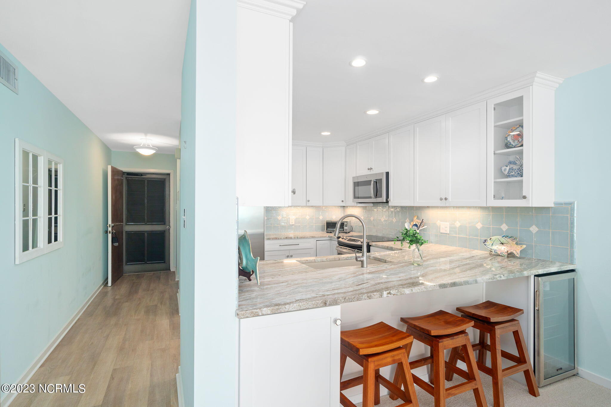 525 Salter Path Road, Unit A33 Atlantic Beach, NC 28512 - Photo 7 of 37 Kitchen w/ bar seating