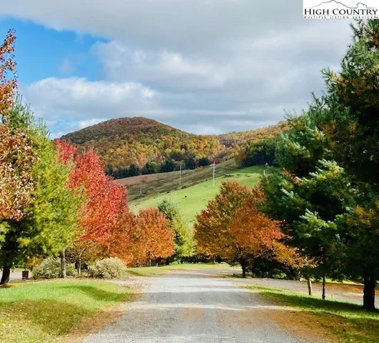 a view of a lake with a big yard