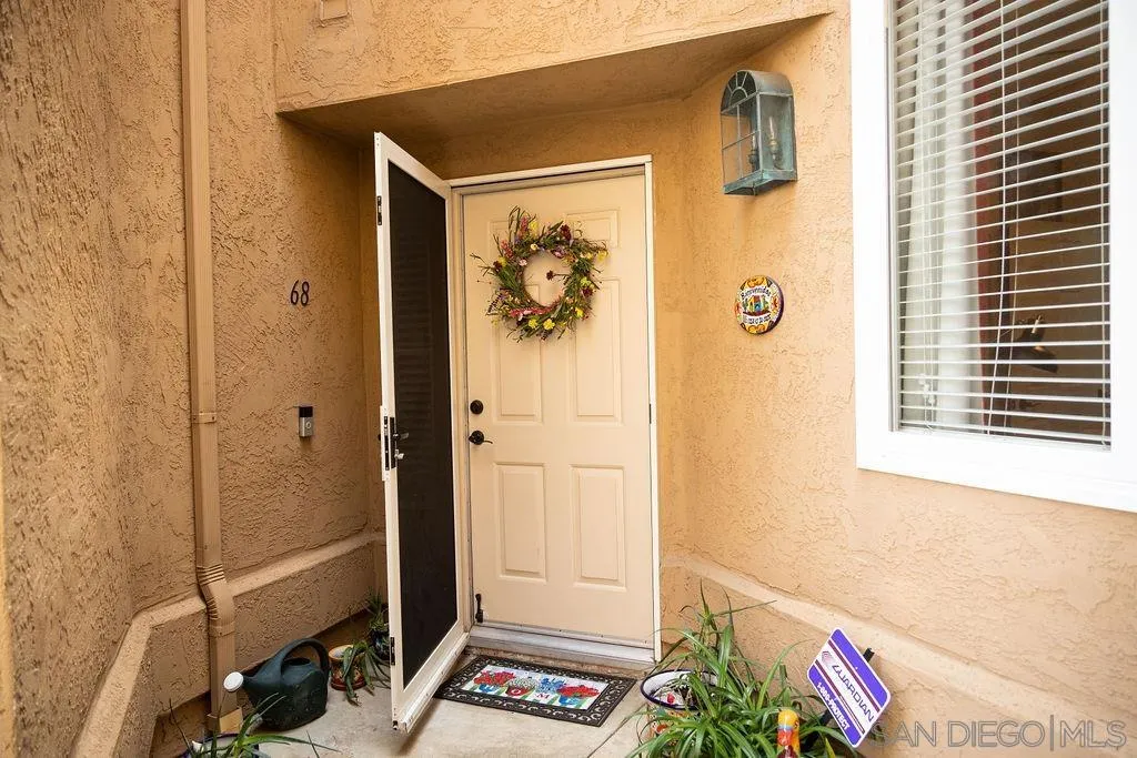 13890 Pinkard Way, Unit 68 El Cajon, CA 92021 - Photo 2 of 25 a view of room with window and wardrobe