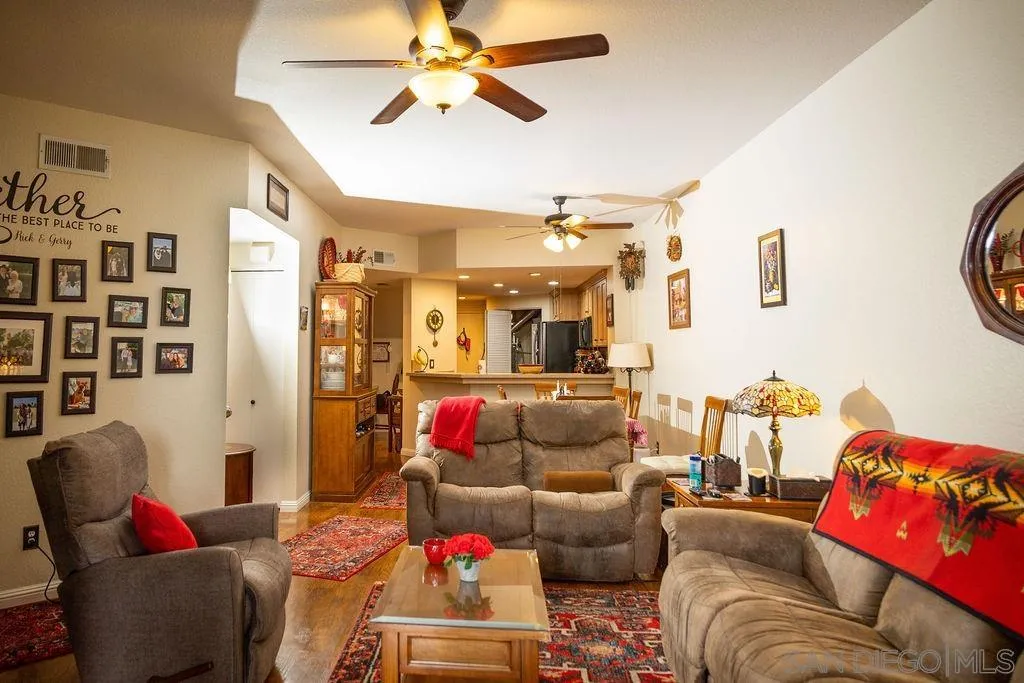 13890 Pinkard Way, Unit 68 El Cajon, CA 92021 - Photo 4 of 25 a living room with furniture and a couch