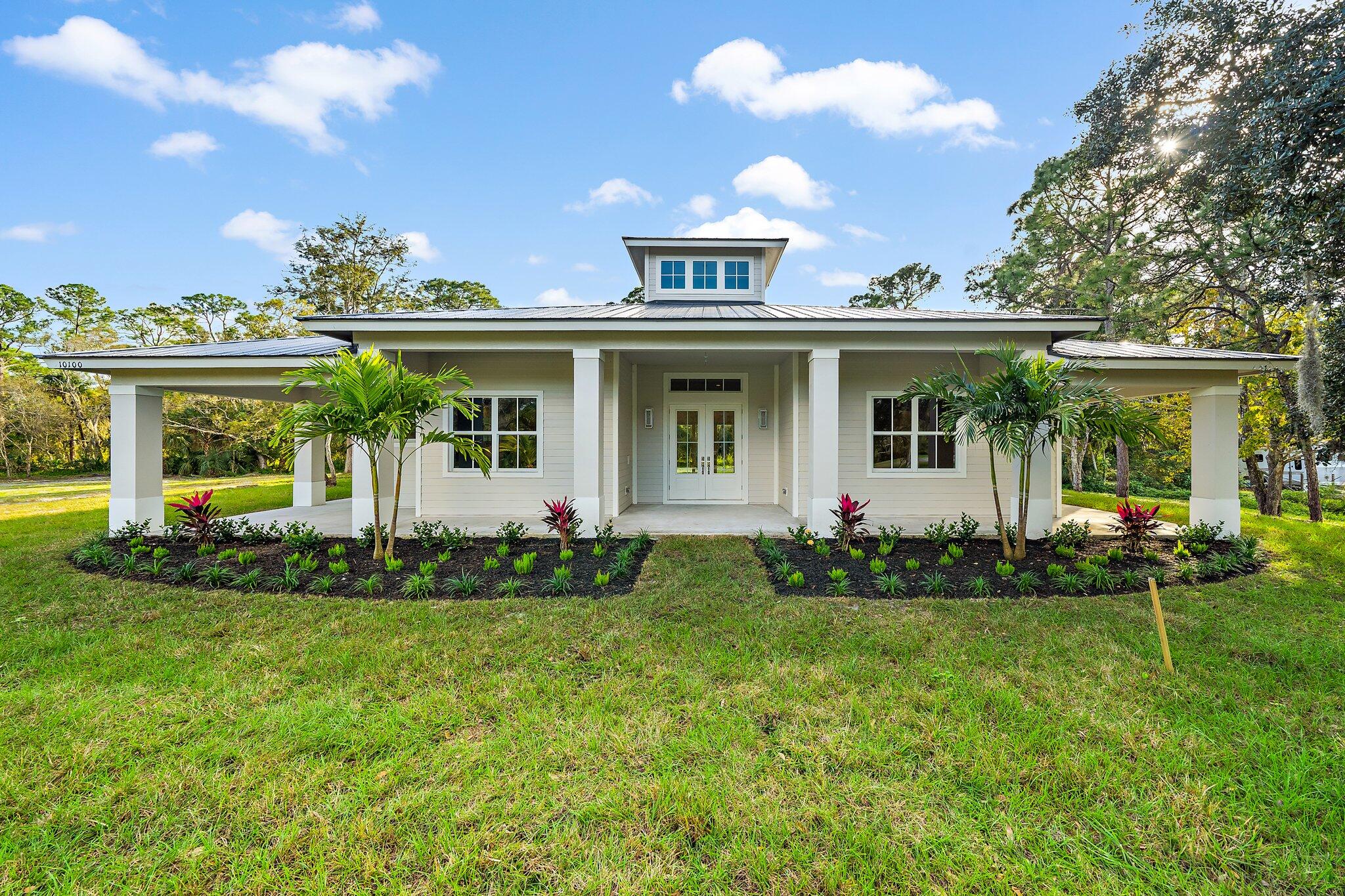 10100 175th Road North Jupiter, FL 33478 - Photo 1 of 40 Front exterior