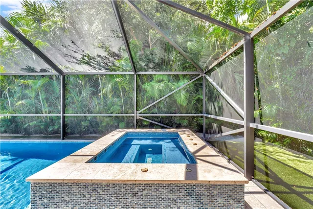 a view of outdoor space with swimming pool