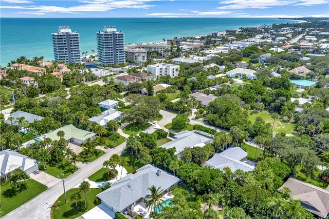 an aerial view of residential building and trees