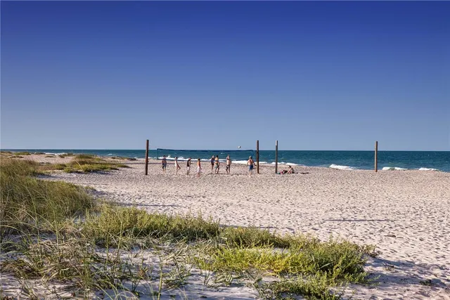a view of a water with a building in the background