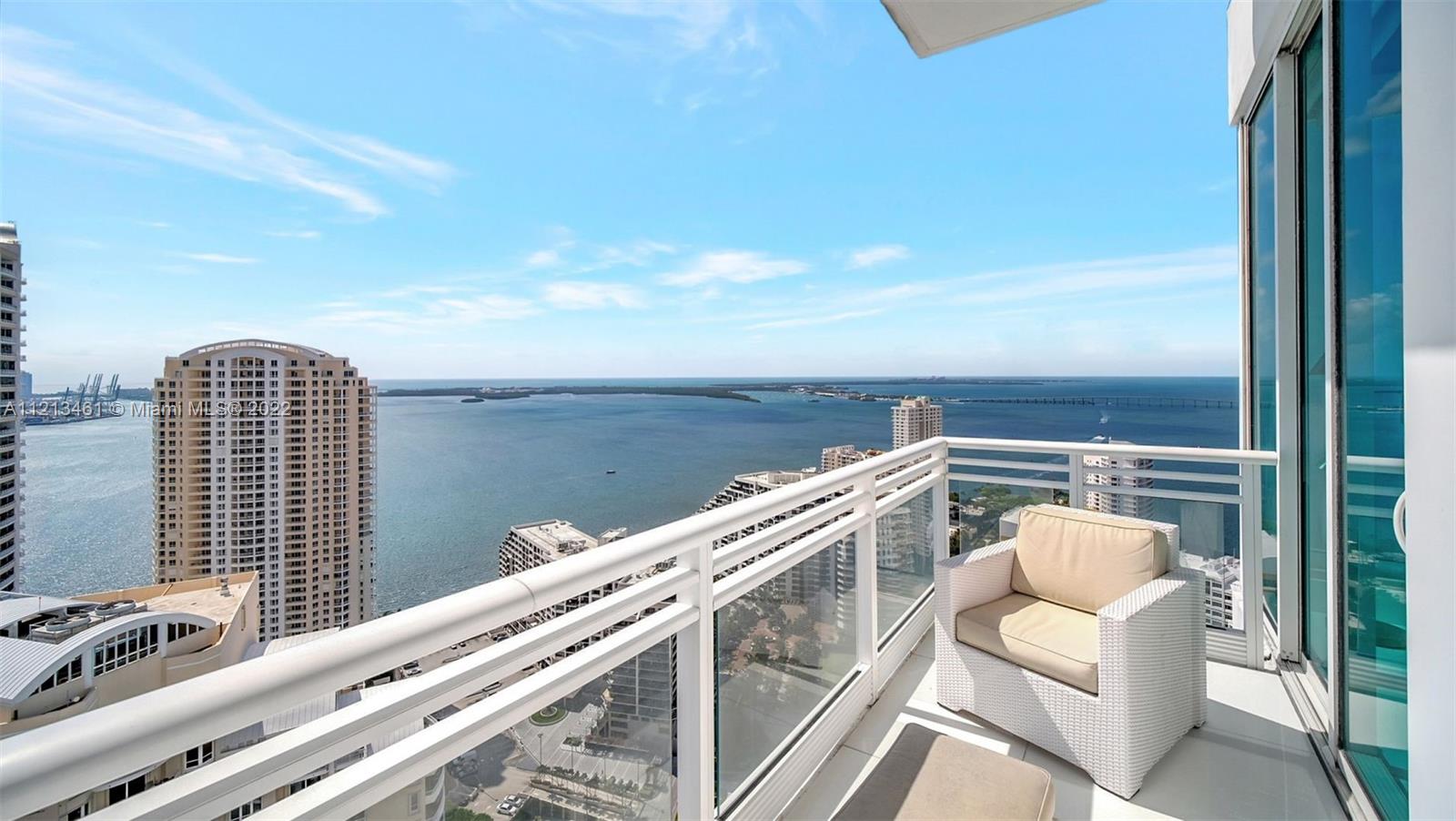 900 Brickell Key Boulevard, Unit 3103 Miami, FL 33131 - Photo 15 of 46 a view of roof with city view