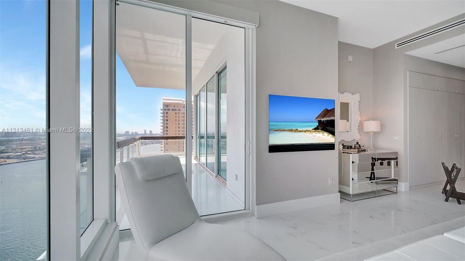 900 Brickell Key Boulevard, Unit 3103 Miami, FL 33131 - Photo 25 of 46 a room with window and a view of living room