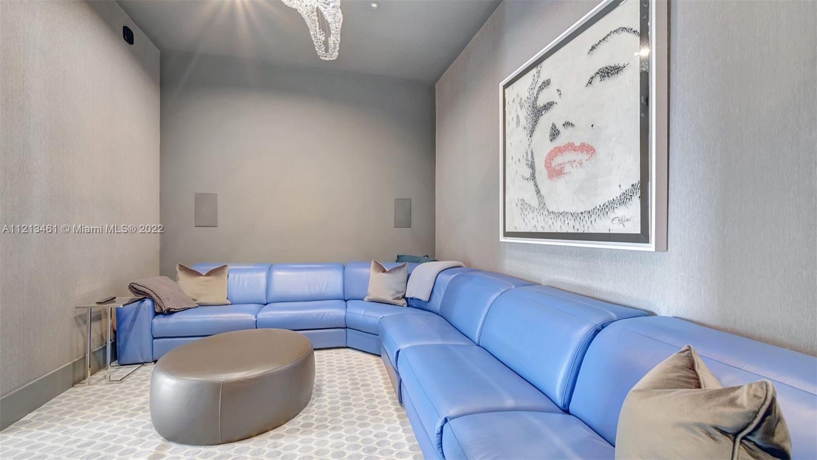 900 Brickell Key Boulevard, Unit 3103 Miami, FL 33131 - Photo 38 of 46 a living room with furniture and a couch