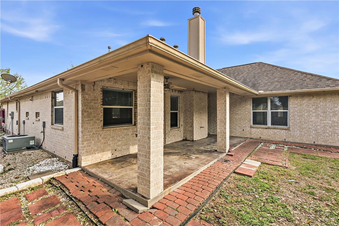 5310 Draycott Court Bryan, TX 77802 - Photo 29 of 31 a front view of a house with a garden