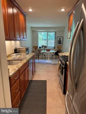 a bedroom with bed and window