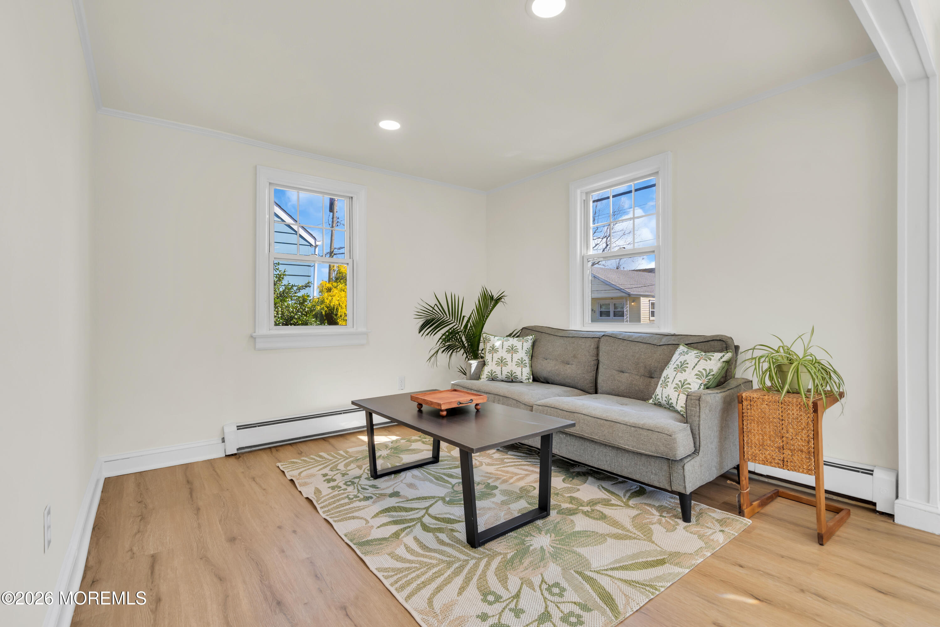 137 Inskip Avenue Ocean Grove, NJ 07756 - Photo 22 of 39 a living room with furniture and wooden floor