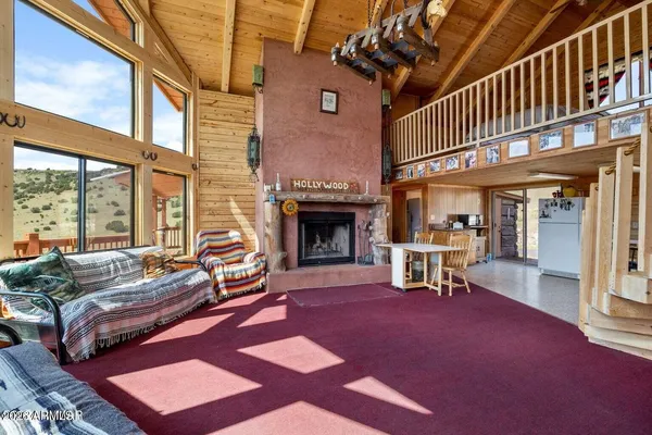 a kitchen with stainless steel appliances a stove a sink dishwasher and a refrigerator