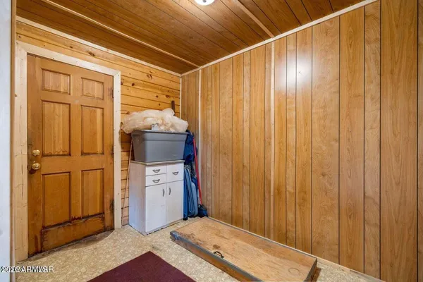 a living room with furniture fireplace and flat screen tv