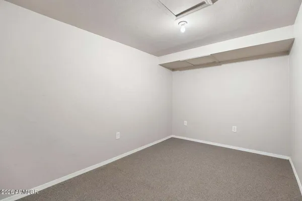 an aerial view of a house with swimming pool