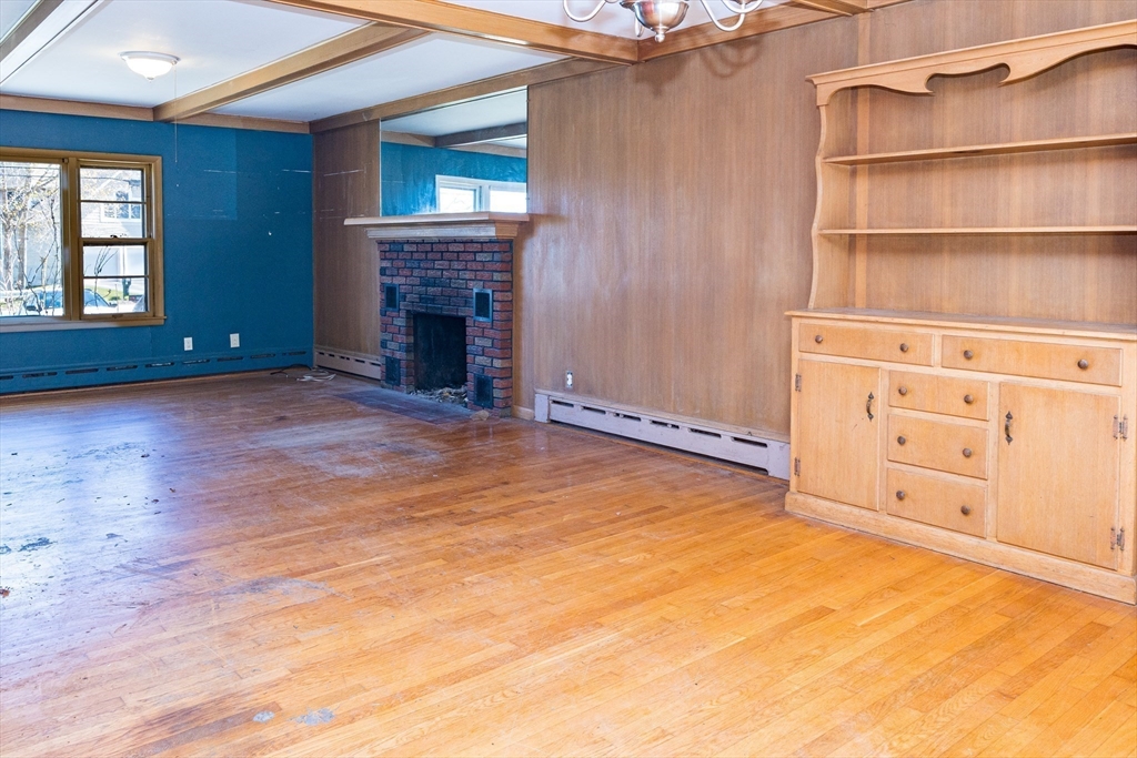 252 Thompson Road Webster, MA 01570 - Photo 12 of 39 a view of an empty room with window and cabinet