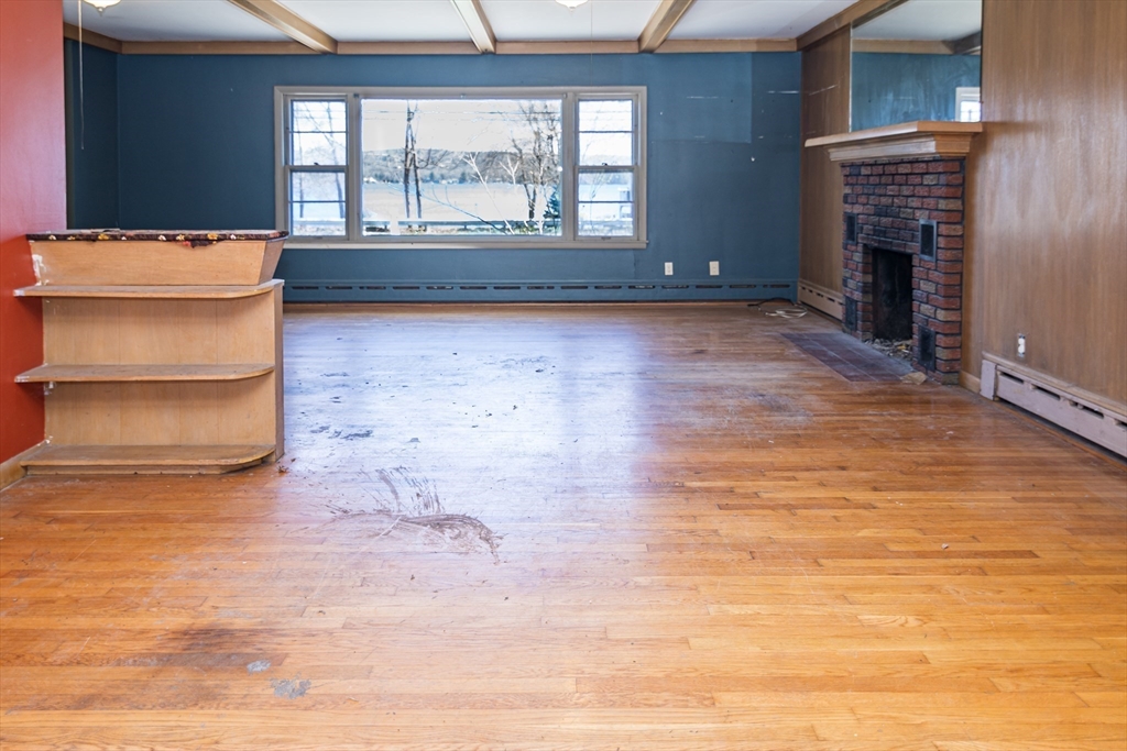 252 Thompson Road Webster, MA 01570 - Photo 13 of 39 a view of livingroom with furniture and fireplace