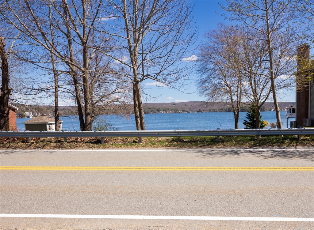 252 Thompson Road Webster, MA 01570 - Photo 4 of 39 a view of yard with large trees