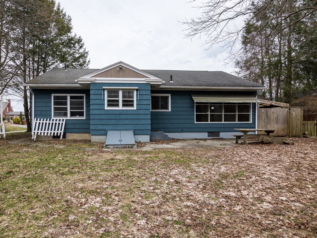 252 Thompson Road Webster, MA 01570 - Photo 7 of 39 a front view of a house with garden