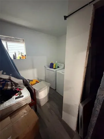 a room with furniture and a window