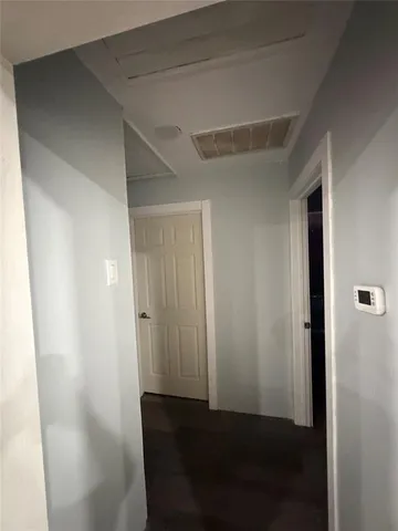 a view of elevator with wooden floor