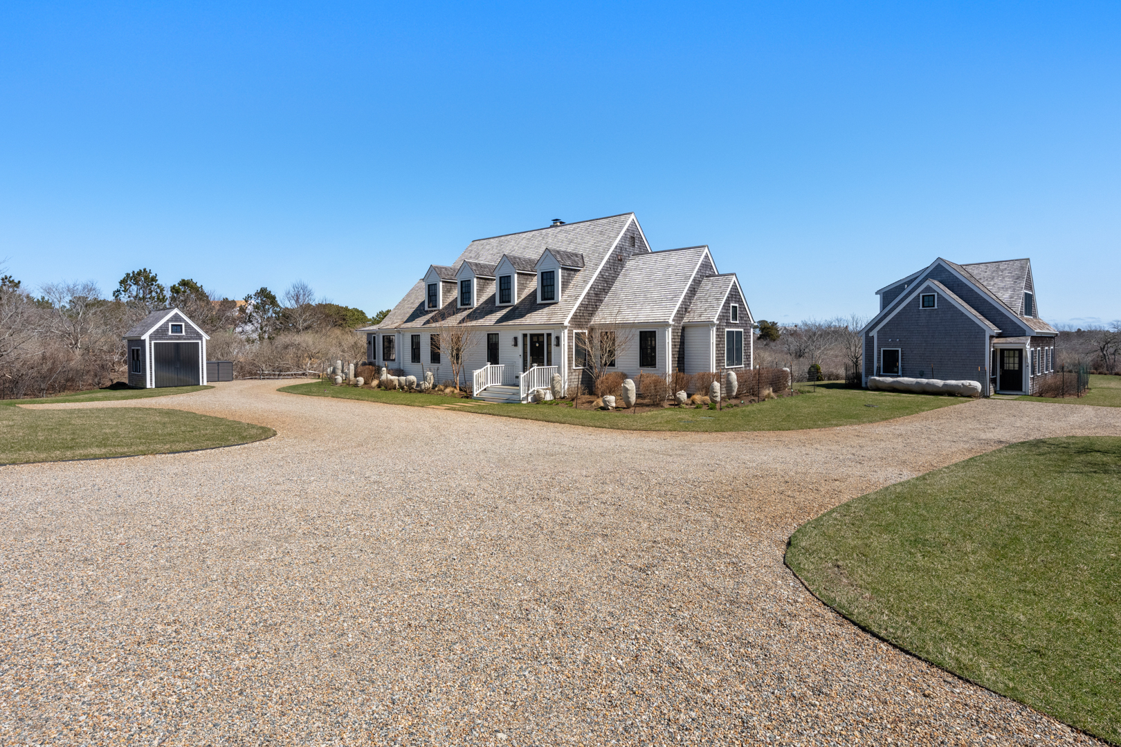 174 Cliff Road Nantucket, MA 02554 - Photo 48 of 49 front view of a house with a yard