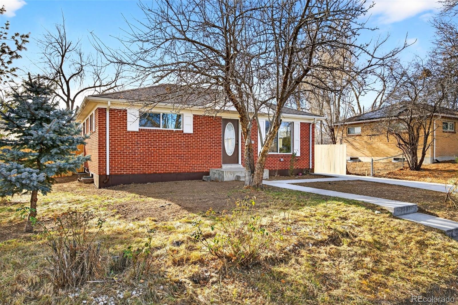 368 Emery Road Northglenn, CO 80233 - Photo 2 of 28 a front view of house with yard