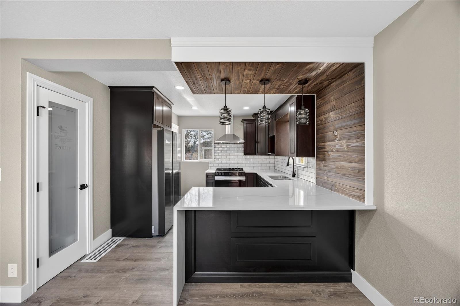 368 Emery Road Northglenn, CO 80233 - Photo 21 of 28 a bathroom with a sink and a mirror