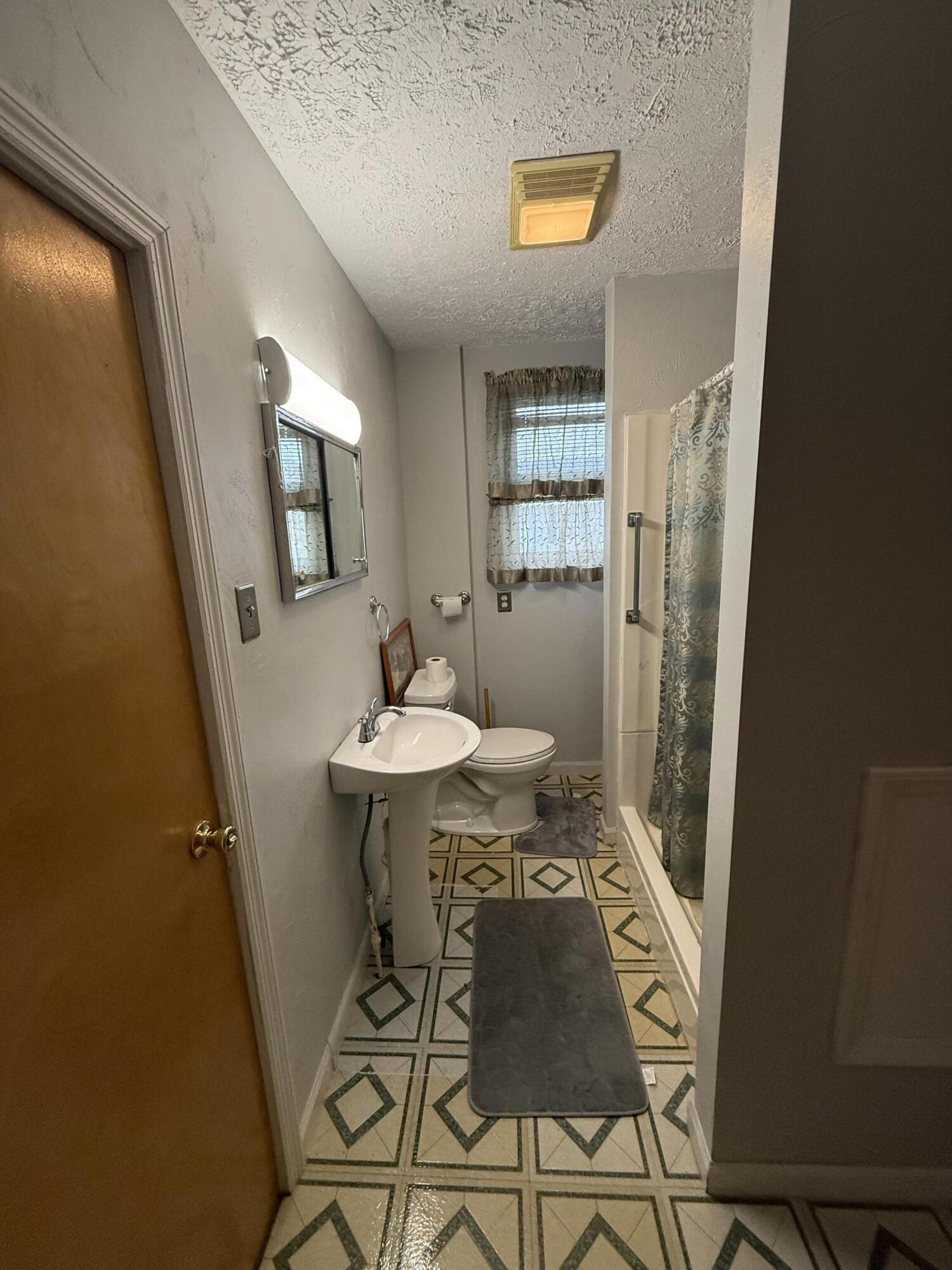 625 West Jackson Street Covington, VA 24426 - Photo 7 of 9 a view of a livingroom with furniture window and wooden floor