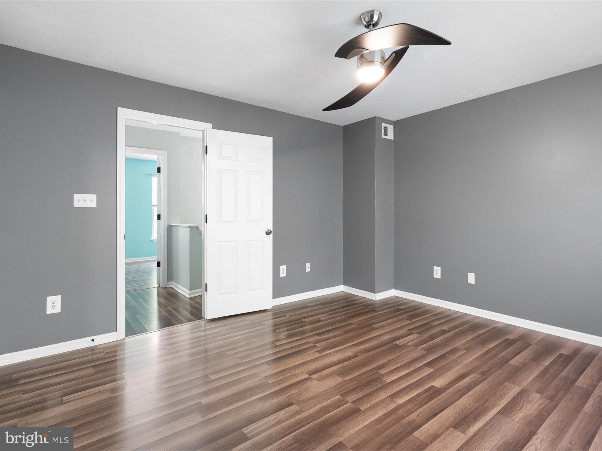 34 Dovetree Drive Newark, DE 19713 - Photo 14 of 29 a view of empty room with wooden floor