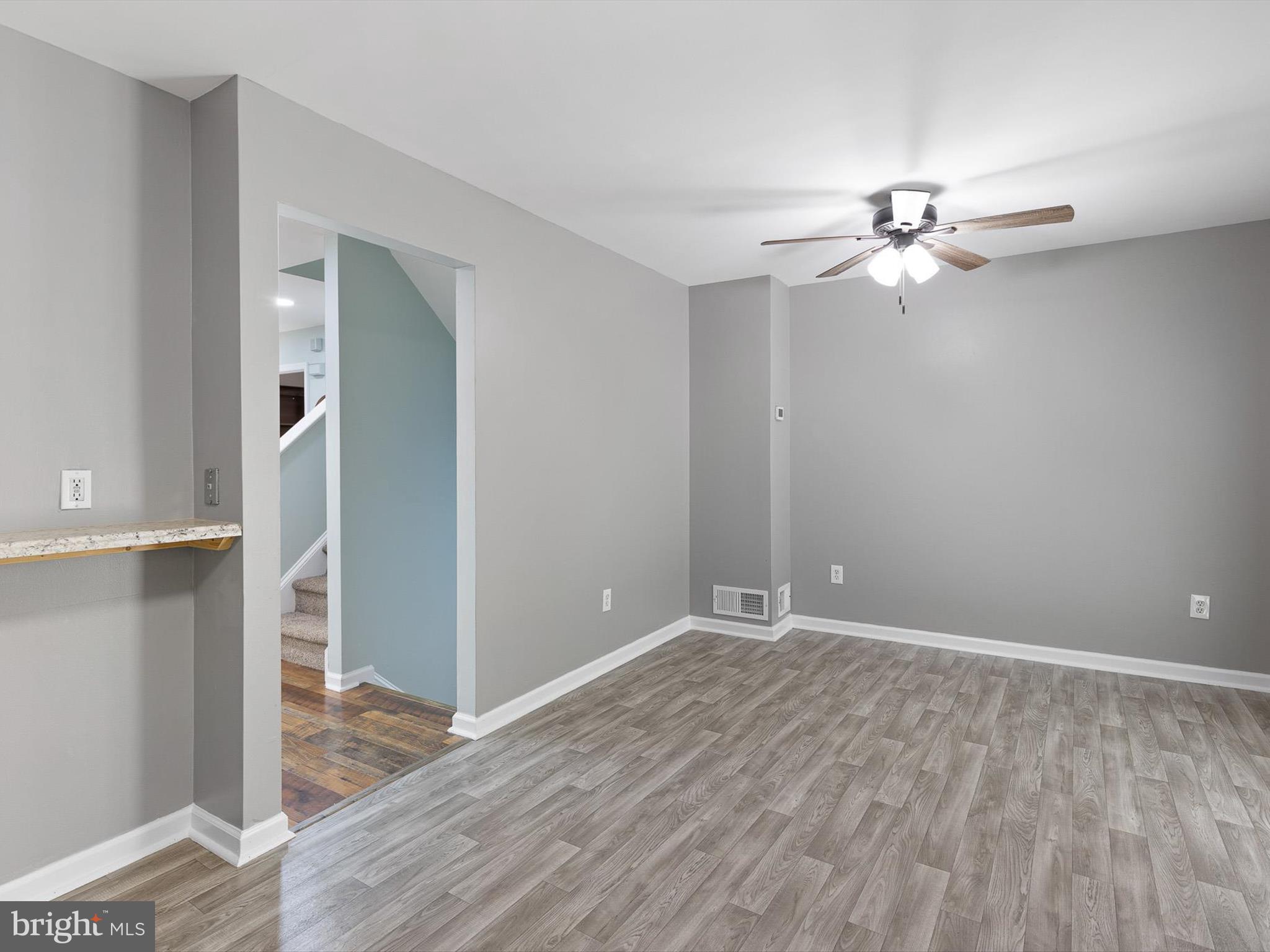 34 Dovetree Drive Newark, DE 19713 - Photo 23 of 29 wooden floor in an empty room with a window