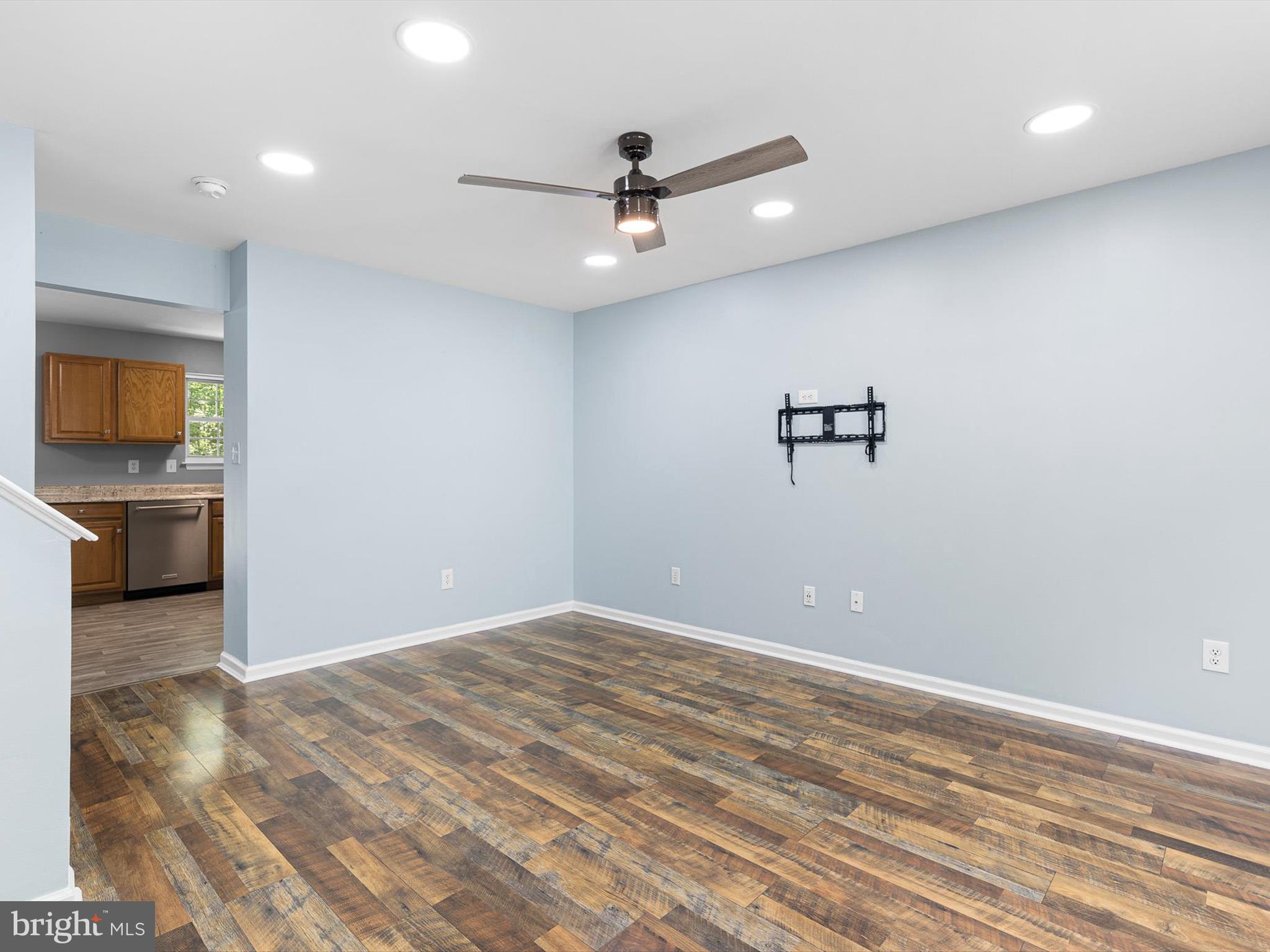 34 Dovetree Drive Newark, DE 19713 - Photo 25 of 29 a view of a livingroom with a ceiling fan and window