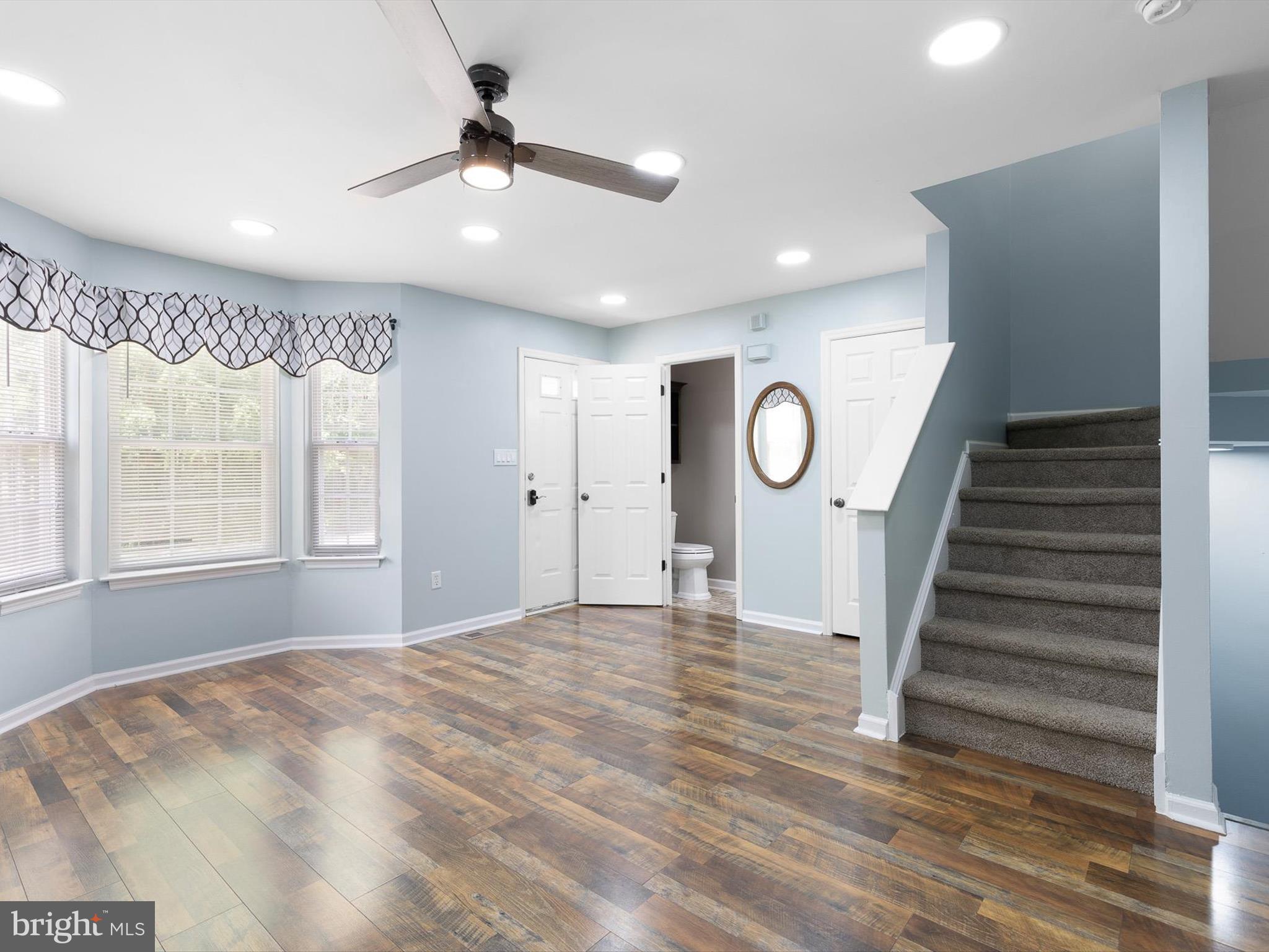 34 Dovetree Drive Newark, DE 19713 - Photo 26 of 29 a view of an empty room with wooden floor and a window