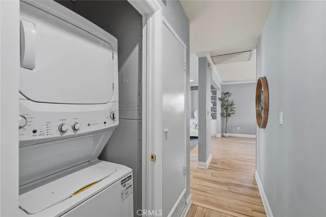 a spacious bathroom with a granite countertop sink a mirror and a shower