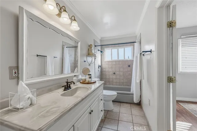 a room with a bed and a window